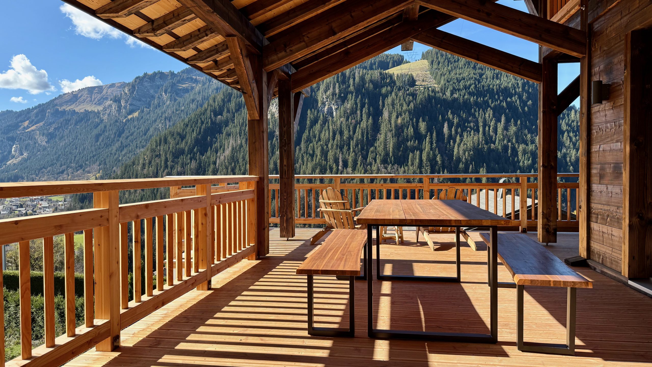 Chalet terrace view looking at mountains in Autumn