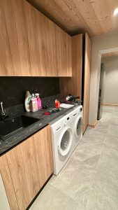 Utility room with laundry equipment